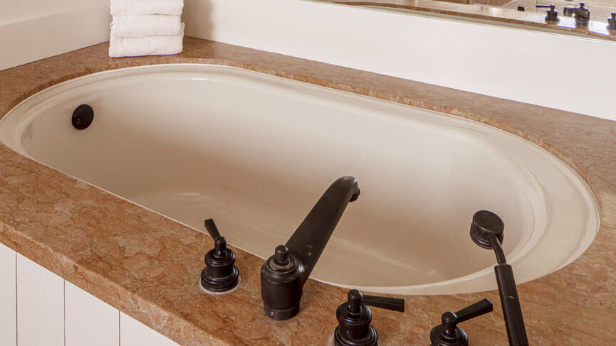 Poetry Inn Emily Dickinson Suite soaking tub {{brizy_dc_image_alt imageSrc=